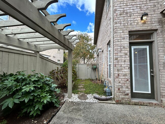 Building Photo - Introducing a stunning townhome/condo in a...