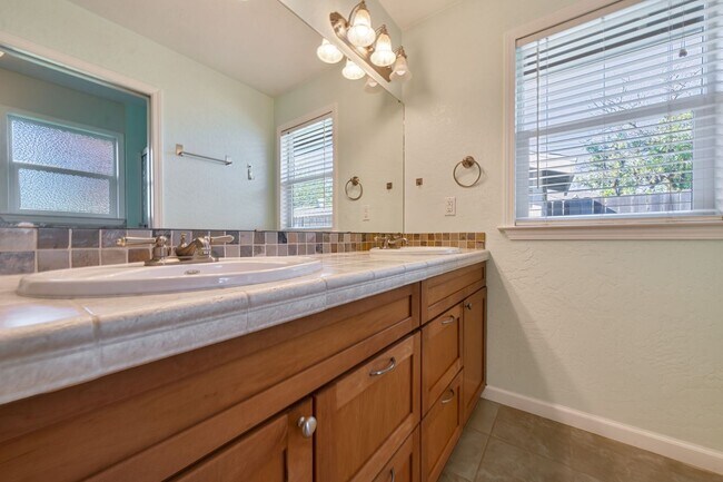 Building Photo - 3BR + Office Home in Excellent Condition with Storage Sheds and Garage Workspace!