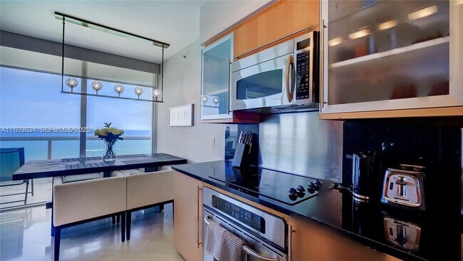 Building Photo - 6365 Collins Ave