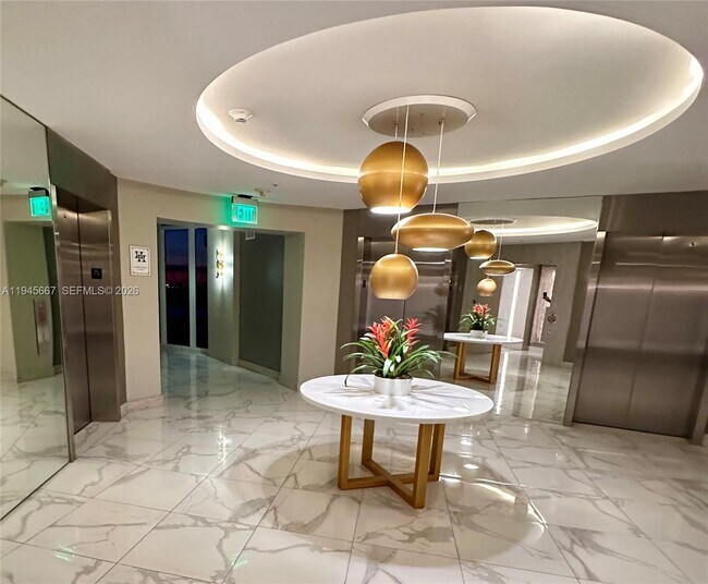 Building Photo - 10275 Collins Ave