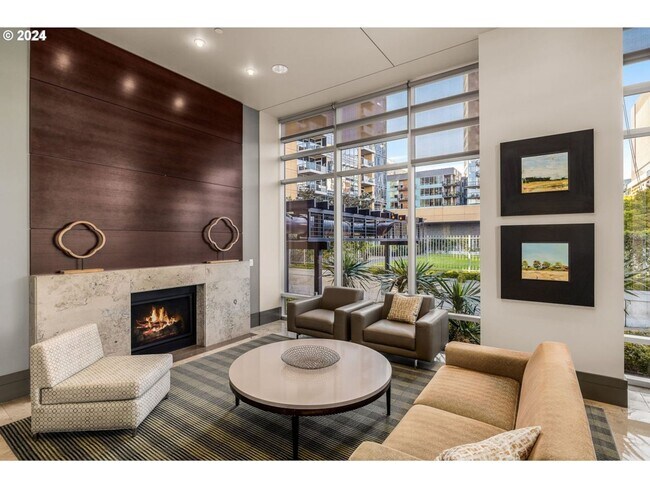Building Photo - Spacious, open-concept 1-bedroom 7th floor condo in the South Waterfront District.