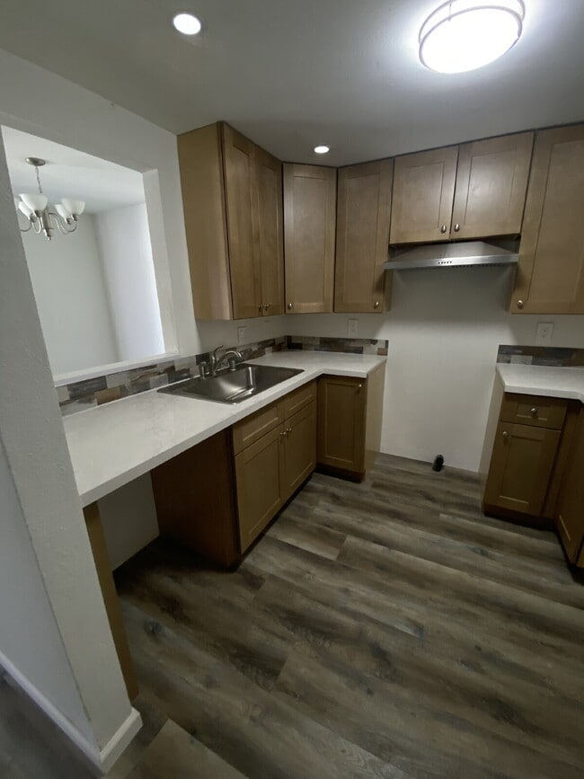 Building Photo - Welcome to this beautifully renovated 2-bedroom, 1.5-bathroom condo located in the highly desirab...
