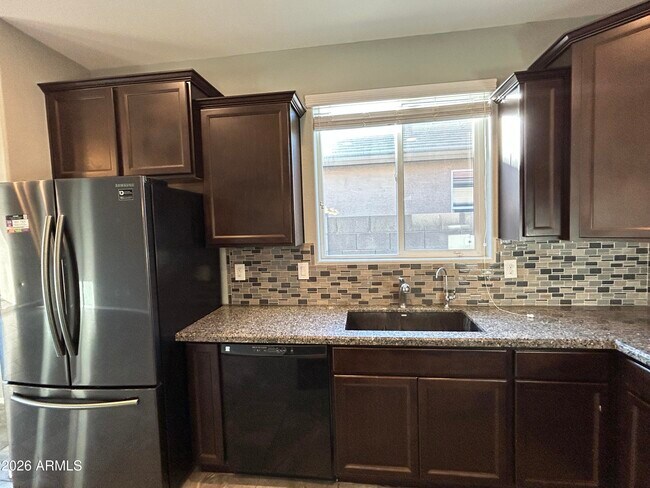 Building Photo - 11741 W Chase Ln