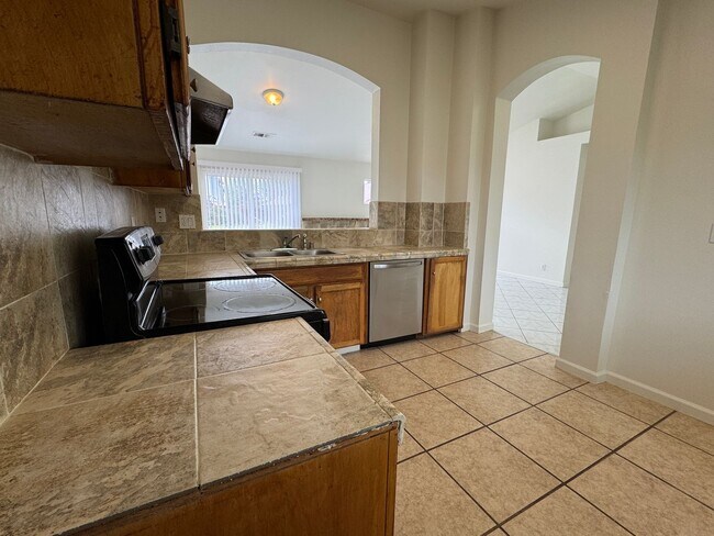 Building Photo - Three Bed, Two Bath Home with Two Car Garage