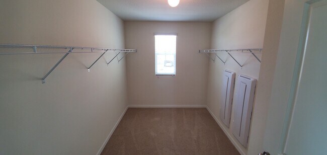 Master Suite Walk-In Closet - 7583 Tuscan Bay Cir
