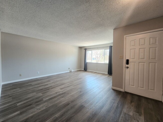 Building Photo - 4 Bedroom Two-Story Home with Downstairs Primary Bedroom & Fireplace