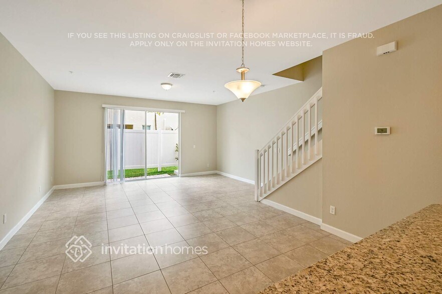 Building Photo - 9495 SW Merlin Ct