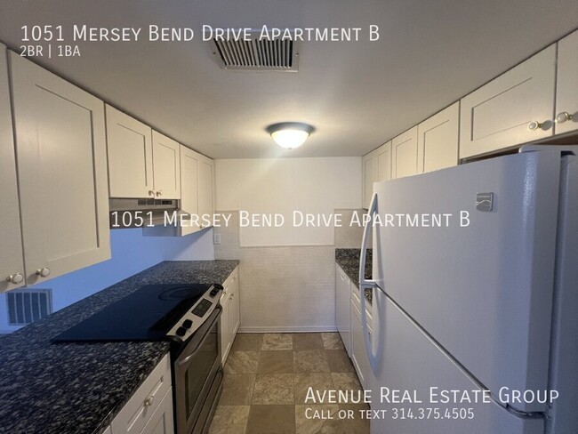 Building Photo - Move-In Ready Condo in Mehlville Schools –...