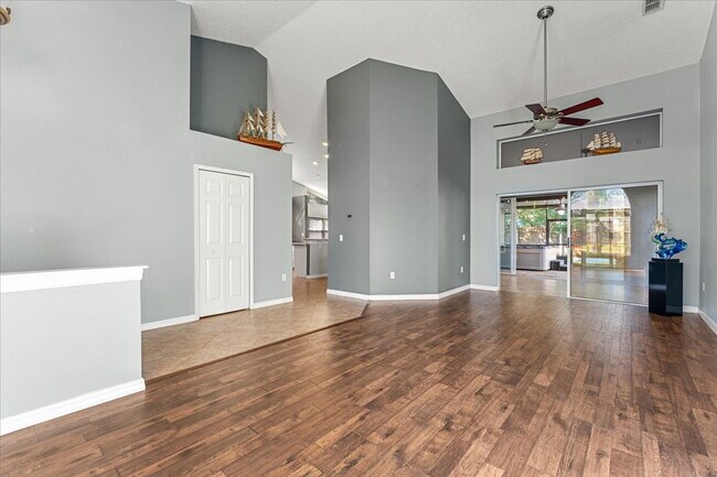 Building Photo - A vibrant 2-bedroom, 2-bathroom tropical retreat designed for both high-energy entertaining and l...
