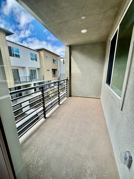 Balcony. Size: 12'x6'. Access from living area on second floor. - 14350 Savannah Ct