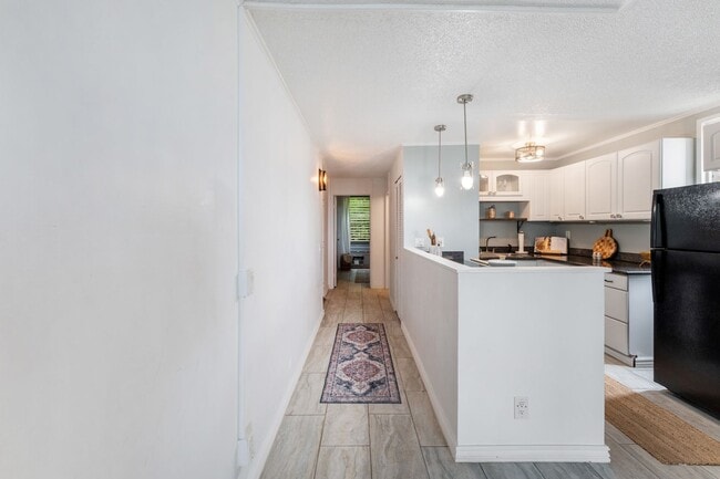 Building Photo - Live your best life in this well-appointed condo in Makaua Village