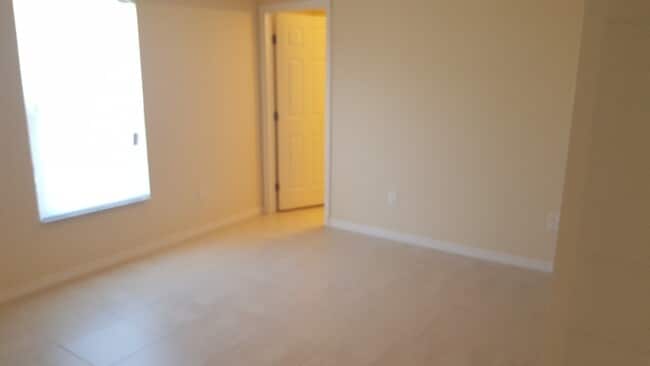 Building Photo - NEWER 3 bedroom 2 bath 1 car garage duplex in SW Cape!!  Lawn Care Included~