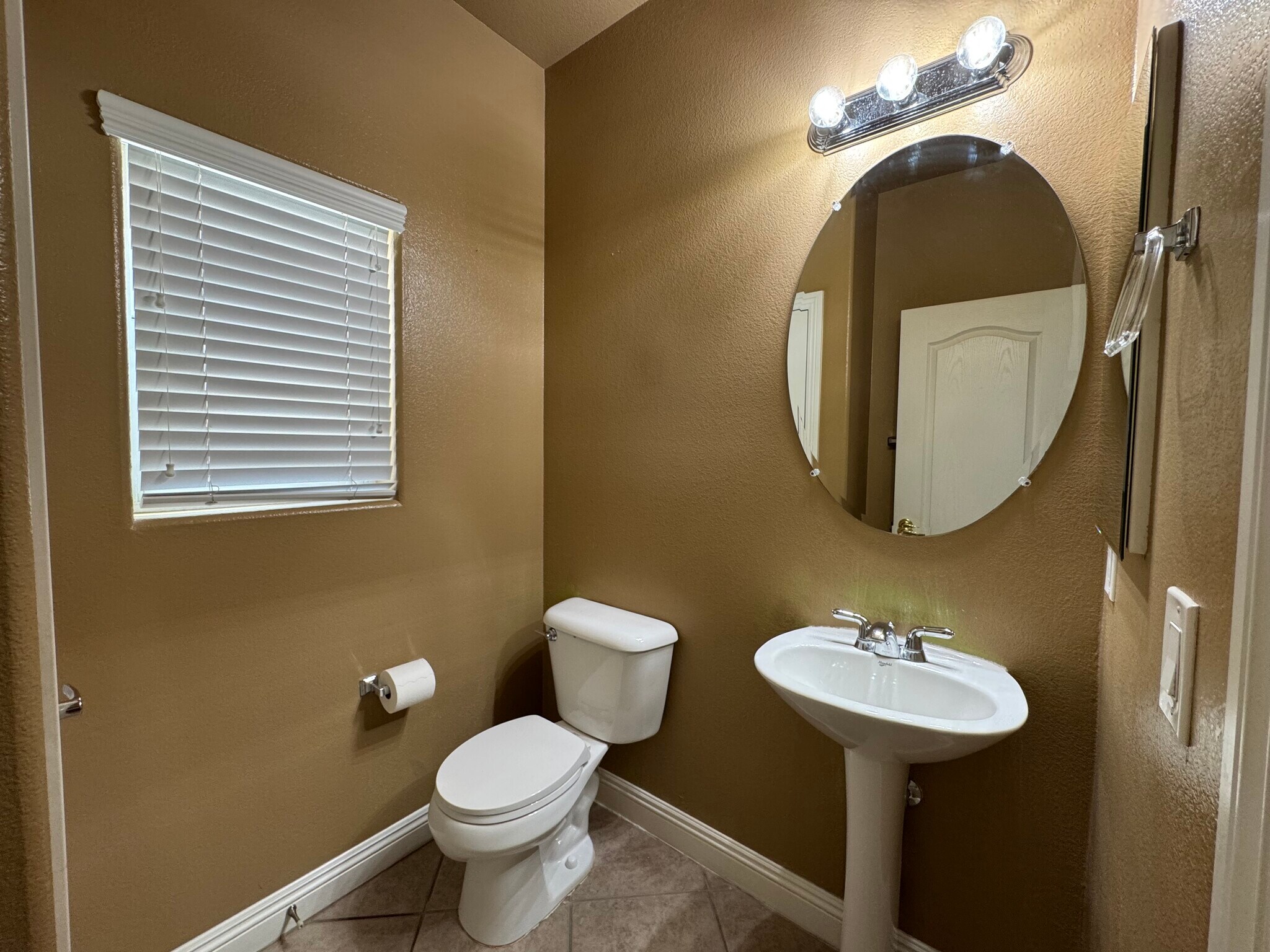 half bath downstairs - 8799 Horizon Wind Ave