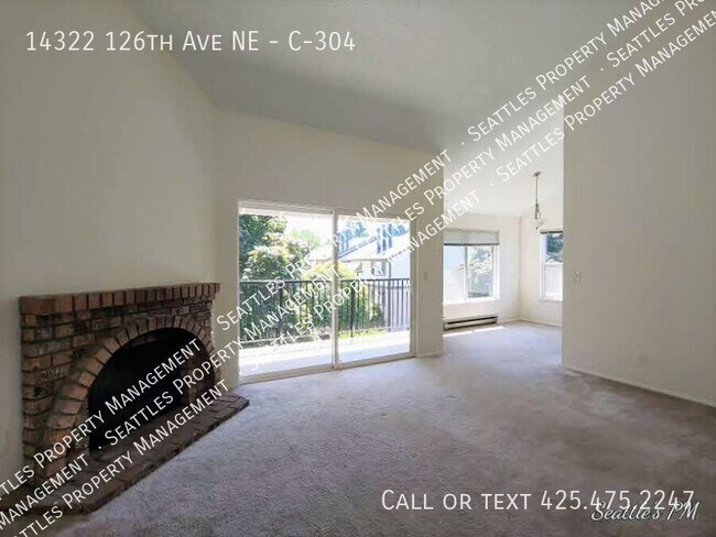 Building Photo - Top Floor 2 Bedroom Condo- with Vaulted Ce...