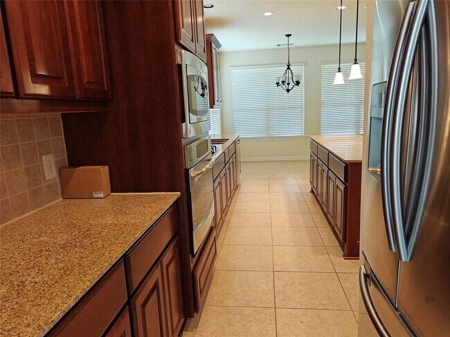 Building Photo - 5551 Twin Rivers Ln