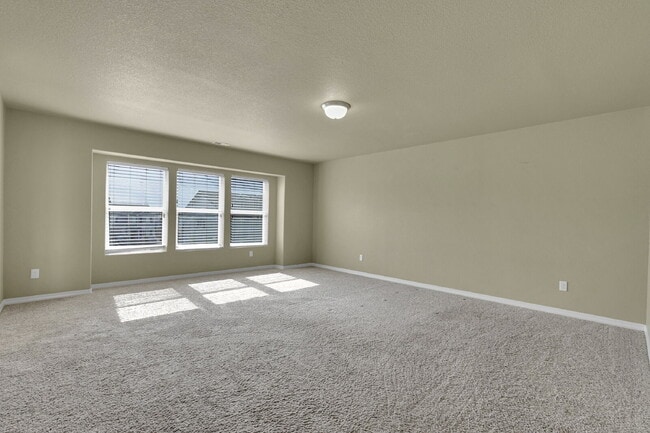 Building Photo - $2,540.95 - 4 Bed, 2.5 Bath Home in CO Springs with Fenced in Yard and 3 Car Garage!