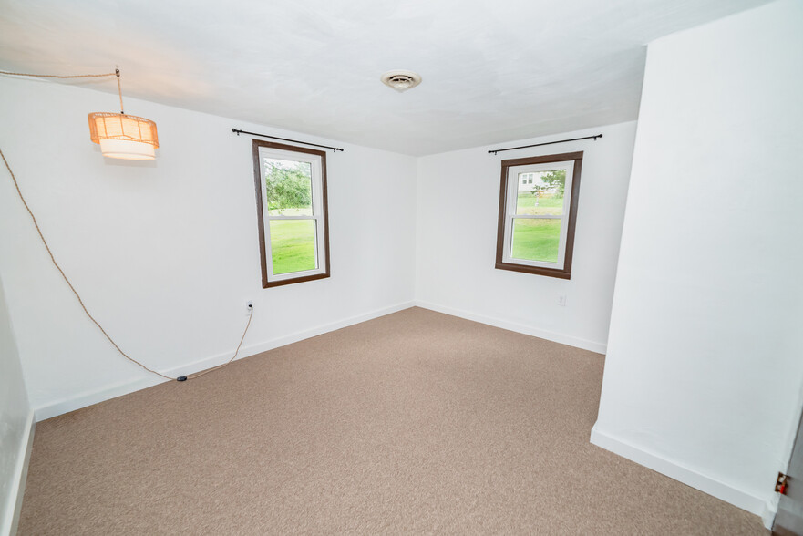 Bedroom with new windows and carpeting - 22 Muckey Rd