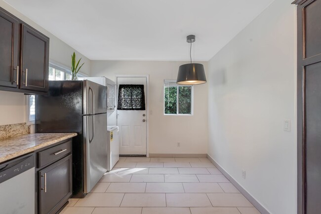 Building Photo - Stylish 2-Bedroom Retreat with Private Yar...