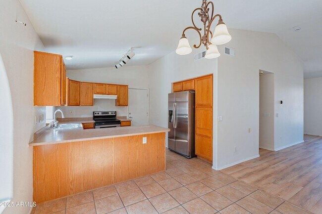 Building Photo - 43741 W Wade Dr