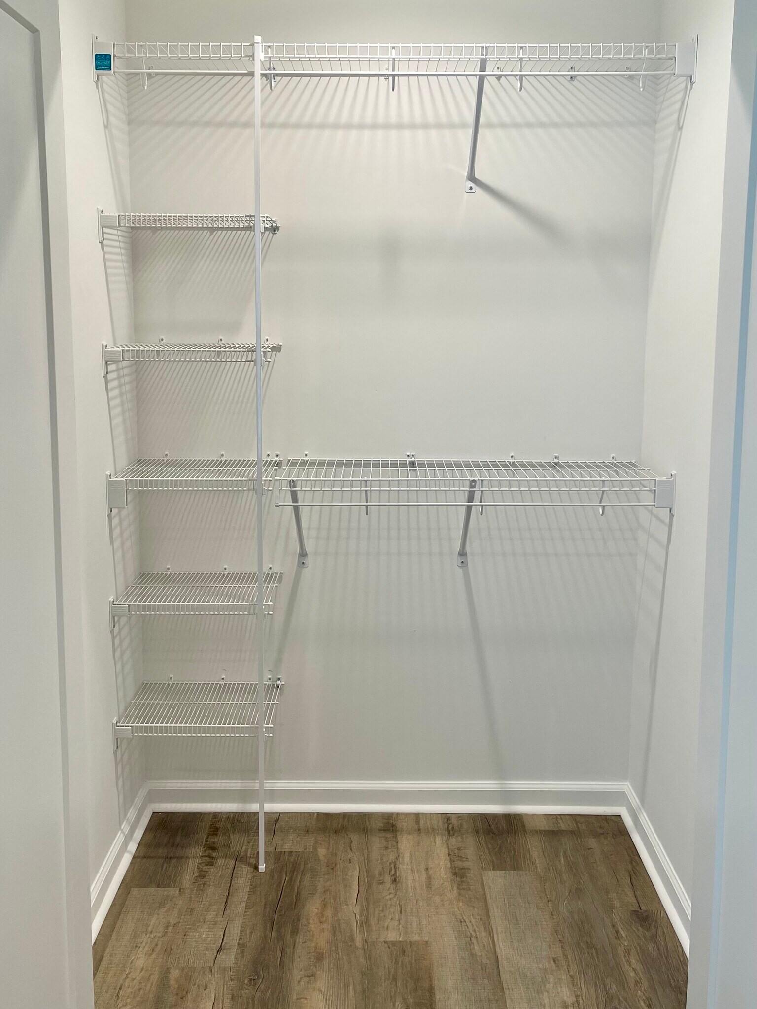 Primary closet, plenty of shelving - 2225 Kenwood Blvd SE