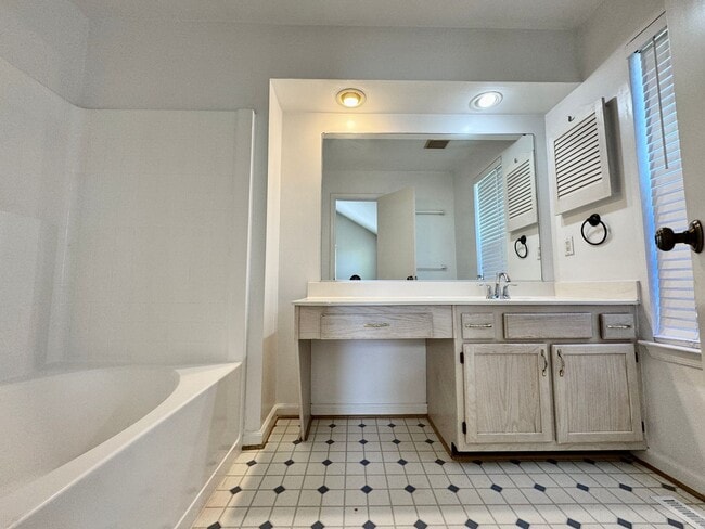 Building Photo - Available 06-15-25! End-Unit Condo w/2 Pri...