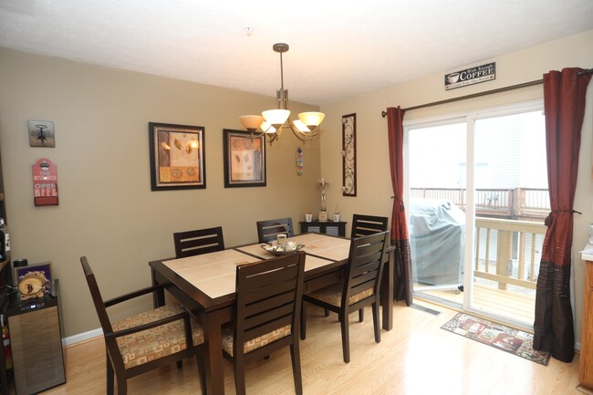 Building Photo - Available -Spacious 2 Car Garaged Townhome...
