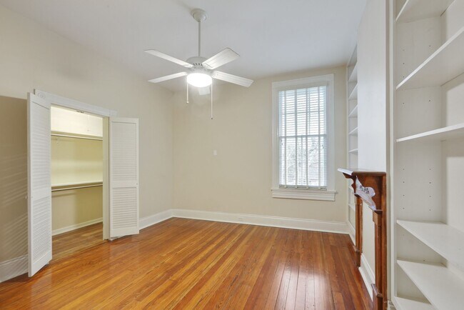Building Photo - Fabulous University Duplex with gleaming floors and stained glass.