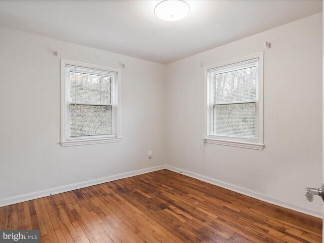 Building Photo - This home blends urban accessibility with peaceful natural surroundings.