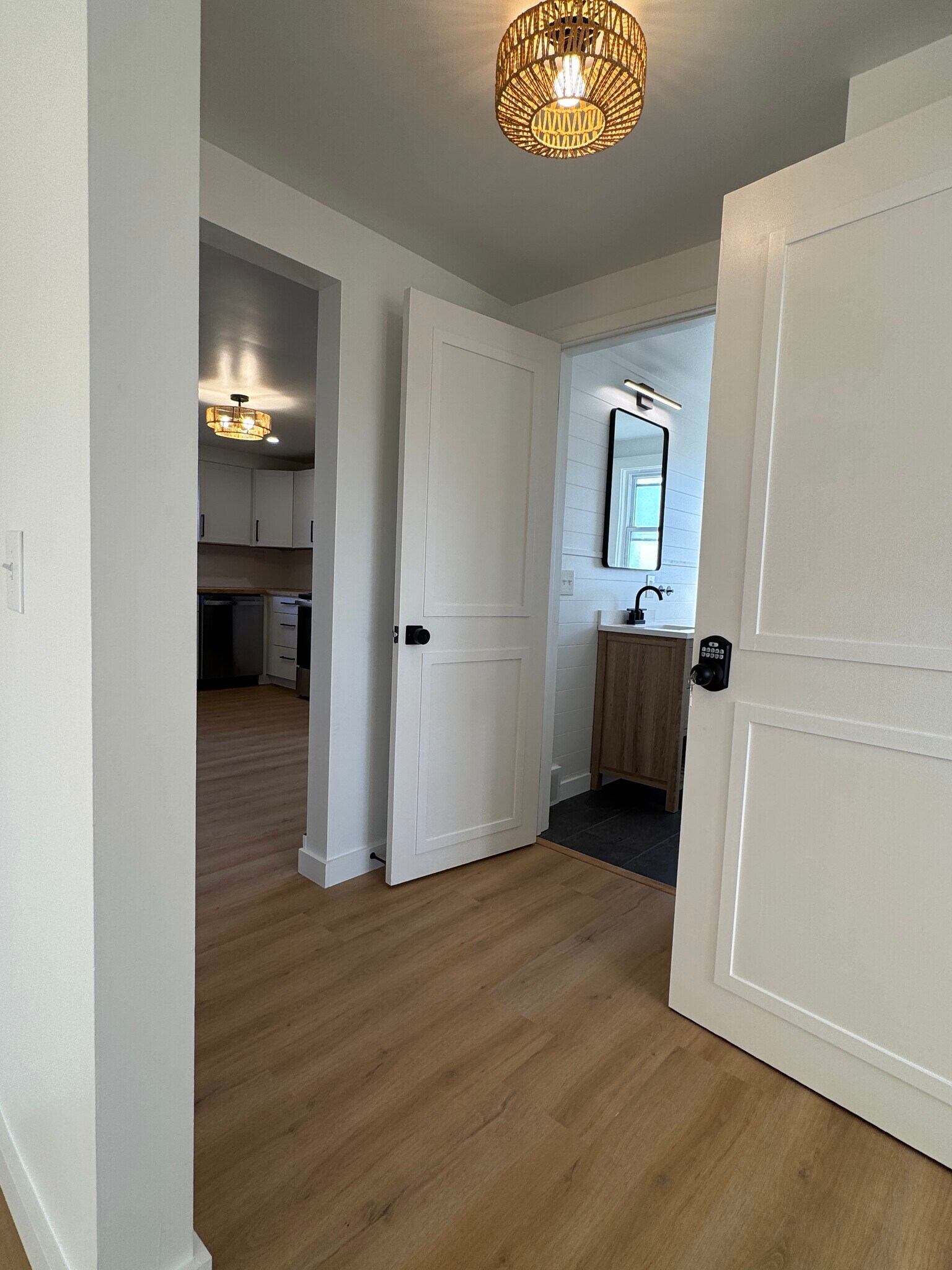 Hallway looking into bathroom and kitchen - 249 Dunlop Ave