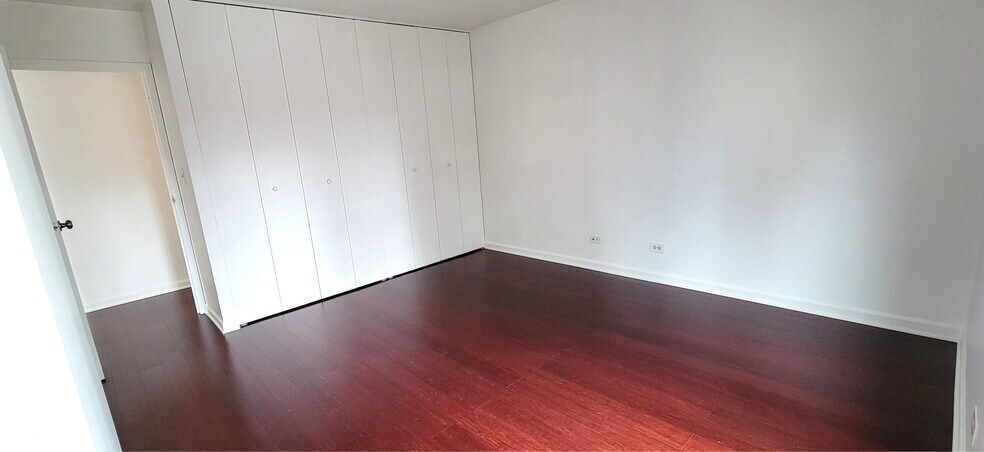 Bedroom view from Window to Closets - 70 W Huron St