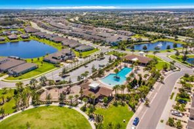 Building Photo - 3/2.5 ANNUAL/FURNISHED OPTION- GORGEOUS To...