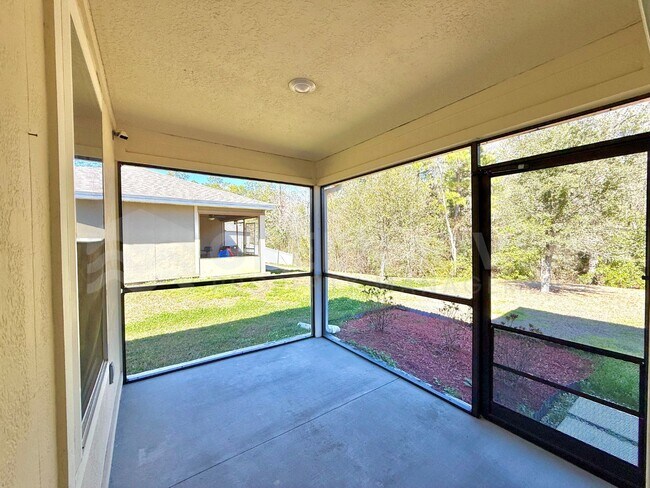 Building Photo - Room to Live, Space to Thrive! Stunning 6BR Home with Solar, Upgrades & Screened Lanai in Macclen...