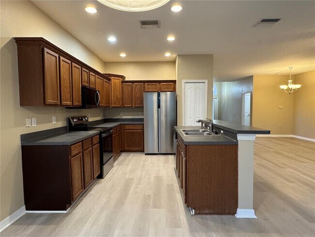 Building Photo - 8210 Whistling Pine Way