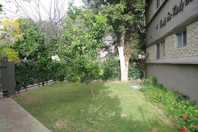 Gardens & Lawn Behind Front Gate - 2636 Kansas Ave