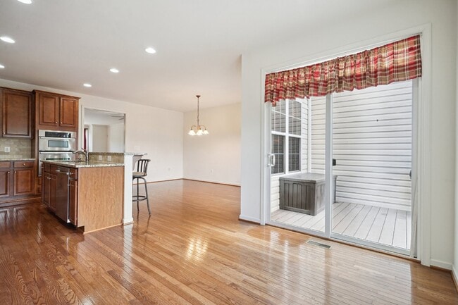 Building Photo - This beautiful townhome spans three finished levels and over 2800 square feet.