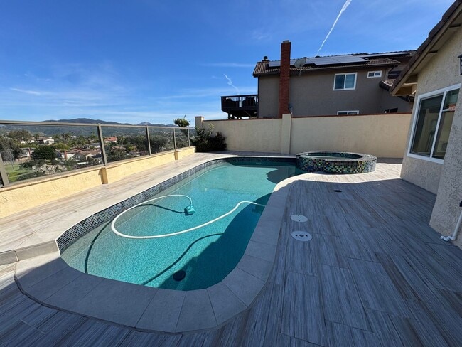 Building Photo - 4 Bedroom house with pool and amazing views