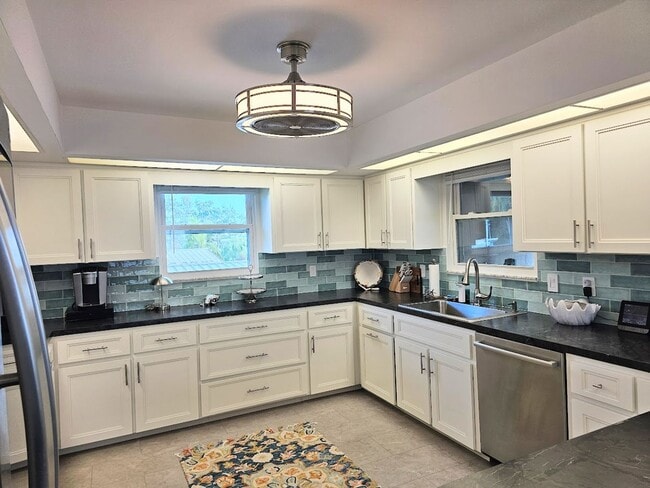 Building Photo - Waterfront 2 Bedroom, 2 Bath Stilt Home with Dock