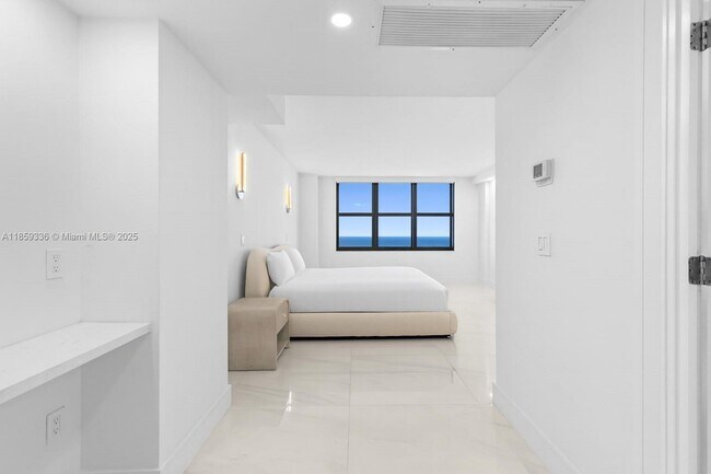 Building Photo - 9801 Collins Ave