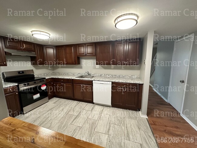 Building Photo - Stylish & Fully Furnished 3-Bedroom, 2-Bat...