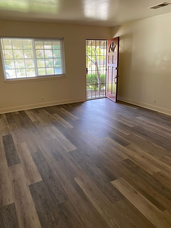 Building Photo - Located near downtown! Updated 3bed/2bath home with large family room/Rec room and side RV parking