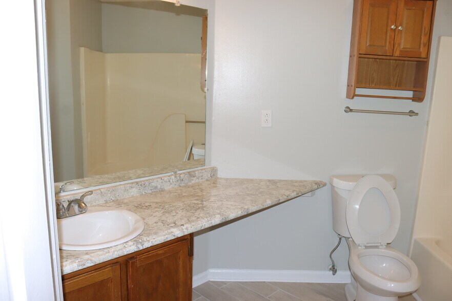 Downstairs Bedroom Bathroom Mirror - 1057 Stones Throw Dr NW