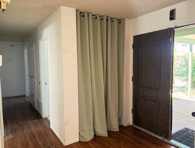 Gracious entry and hall to bedrooms and baths - 170 Westelle Dr