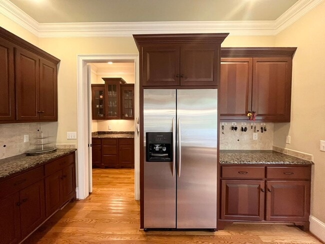 Building Photo - Incredible 4BD, 6.5BA Raleigh Home Near Fa...