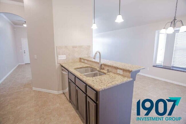 Building Photo - Spacious and modern home in the highly sou...