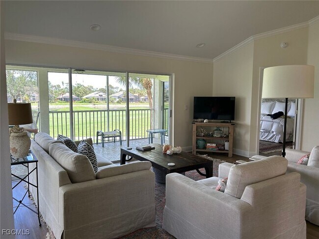 Building Photo - 8361 Grand Palm Dr