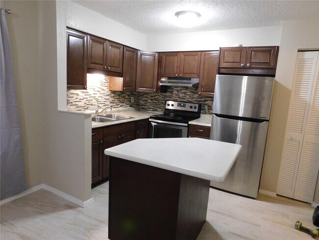 Building Photo - "Charming 1-Bedroom with Granite Touches in Port Charlotte!"