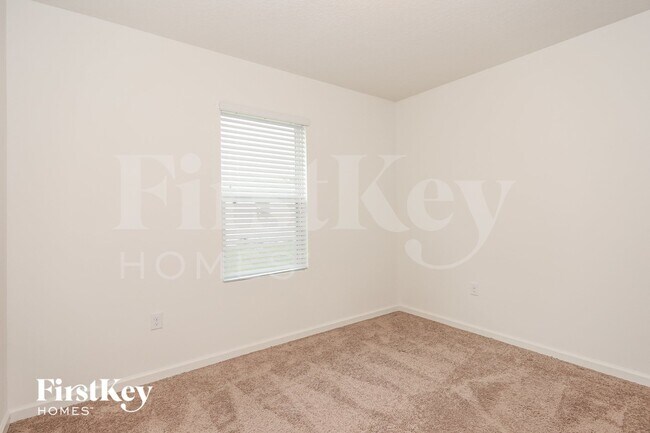 Building Photo - 1053 SW Canary Terrace