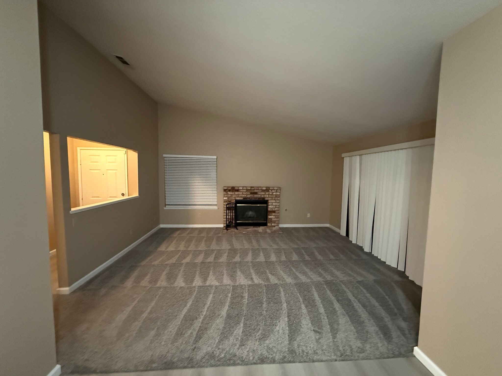 Livingroom new carpet - 1102 Cedar Creek Dr