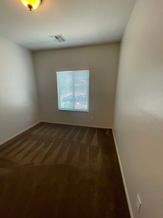 Building Photo - COMING SOON! Fireside at Norterra Spacious...