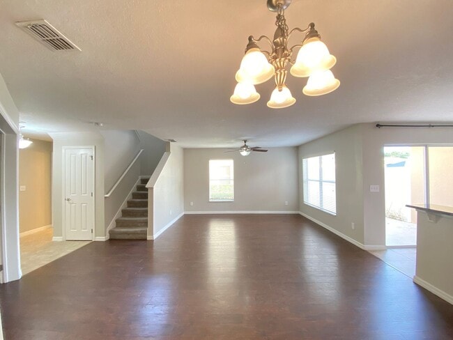 Building Photo - Avalon Park corner end Townhome featuring 3 bedrooms, 2.5 baths, plus office, and 2 car garage.